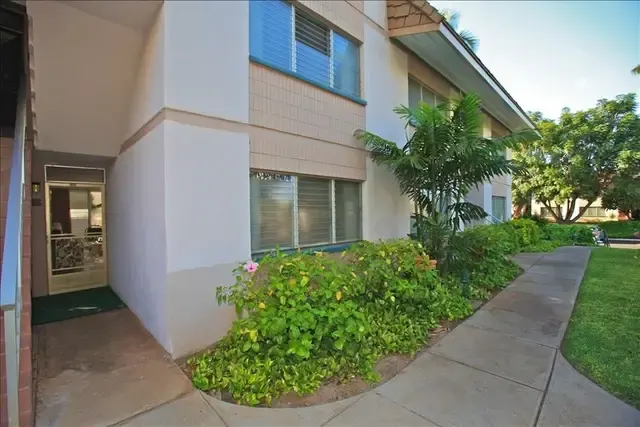 Ground-floor building entrance and landscaped walkway